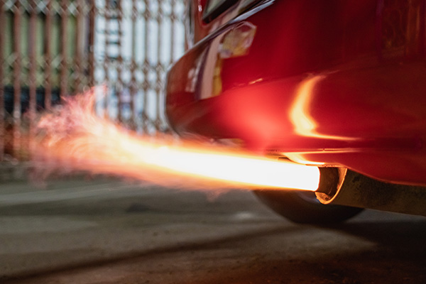 Why Do Some Car Exhausts Make a Popping Sound?